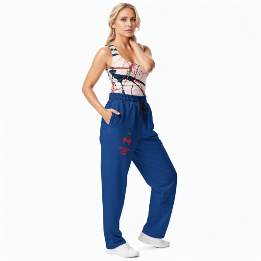 BunnyBanky AI proprietary Model wearing the Angel Performance Tank and The LA Navy Flow Wide Joggers, showing the wide-leg cut, the playful Pop Cherry print, and the binary code on the dark navy fabric.