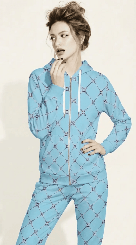 AI Proprietary Model wearing the full Belgravia Set, showing the burgundy and light blue geometric monogram print on both the zip hoodie and the slim fit joggers, emphasizing the cohesive, tailored look of the recycled polyester set.