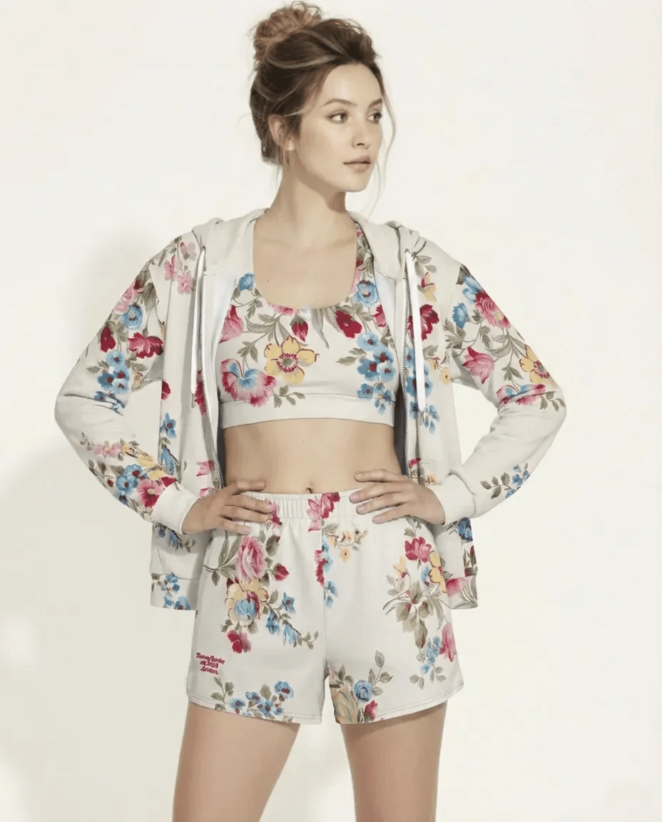 BunnyBankY AI proprietary model wearing the complete Pink Blush Set (Zip Hoodie and Athletic Shorts), showcasing the cohesive serene floral pattern and premium sustainable fit.