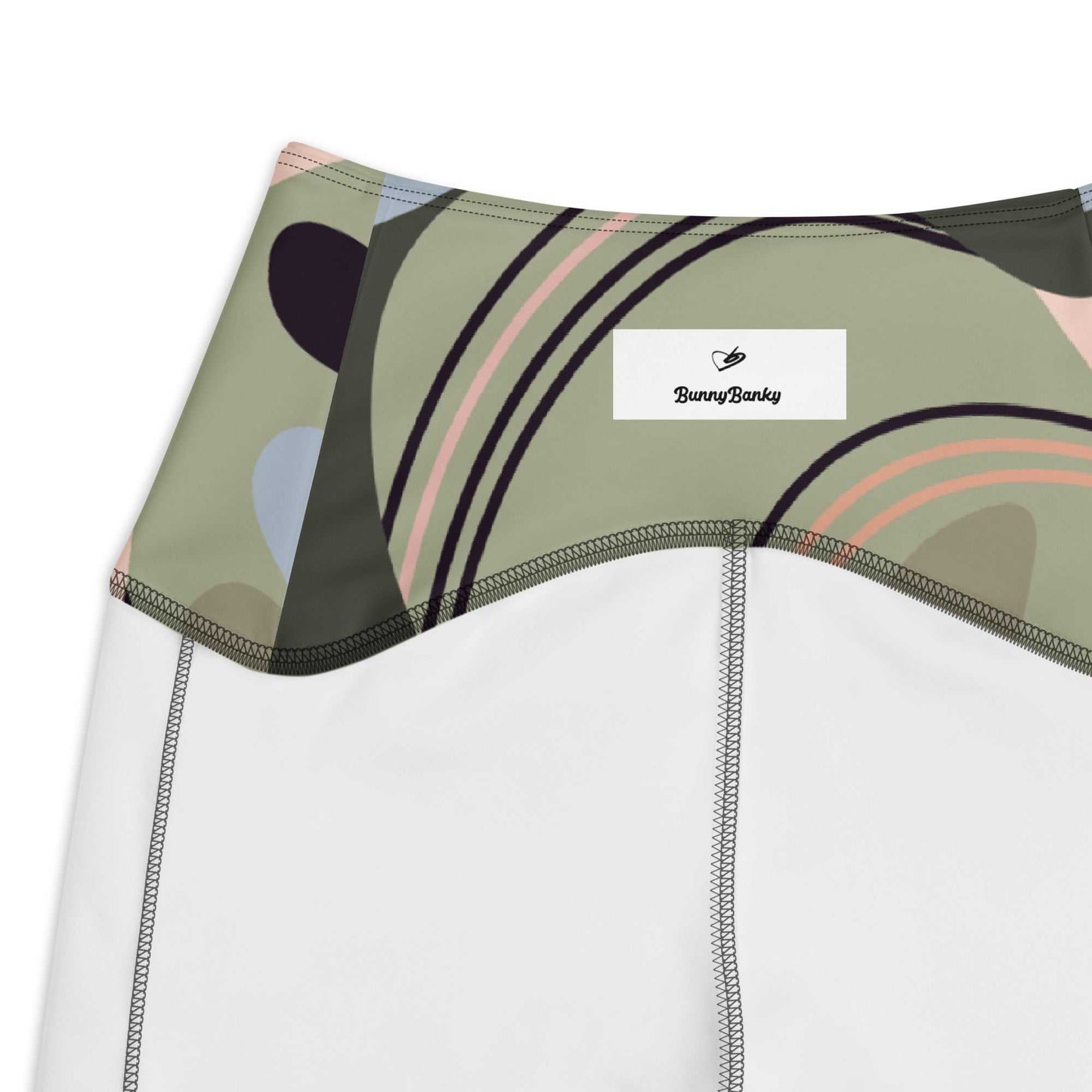 A close-up of The Barbican Sculpt Leggings' elegant, exotic flower print, showing the inside of the soft, recycled fabric.