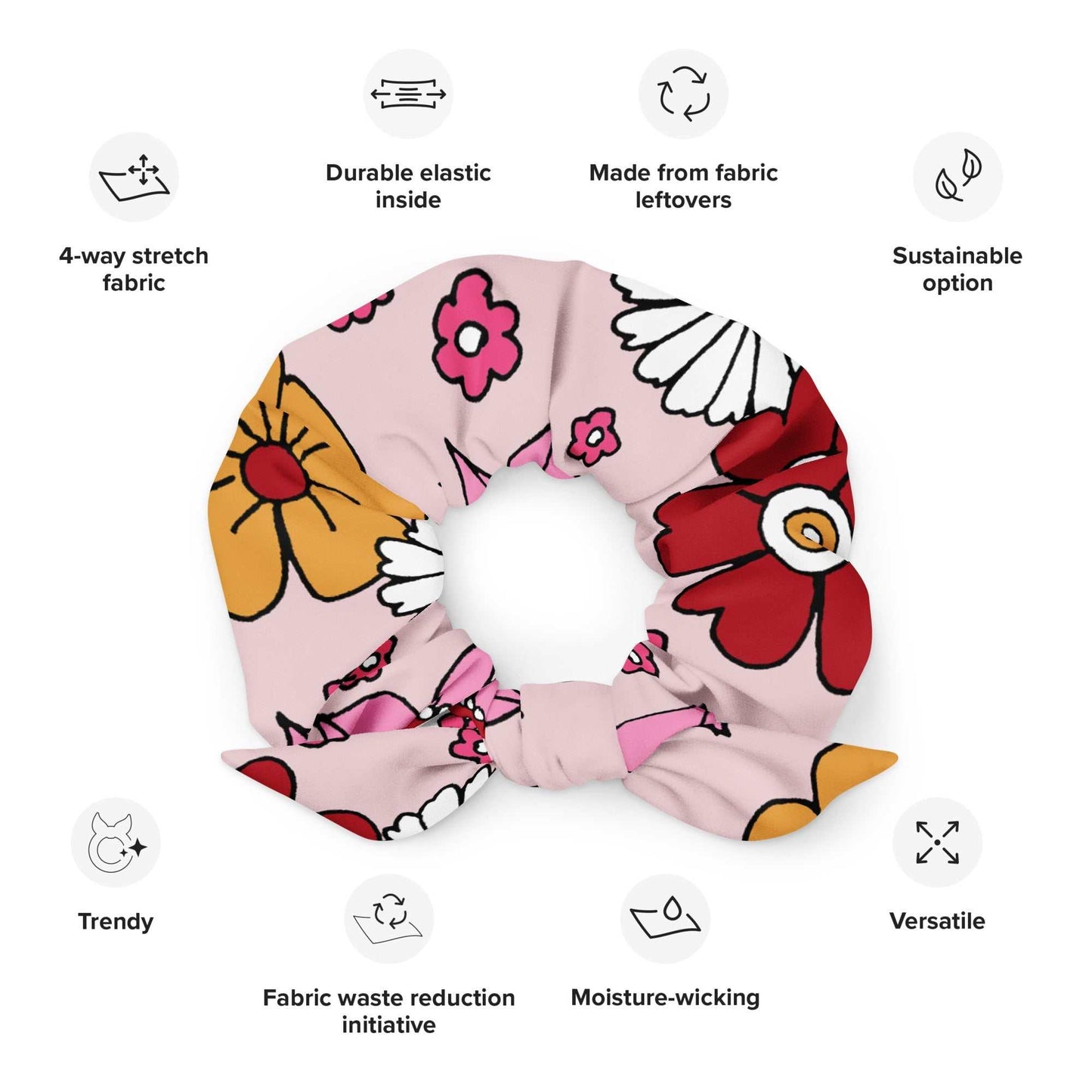 Aclose up of The Primrose Hill Floral Scrunchie showing the detachable bow