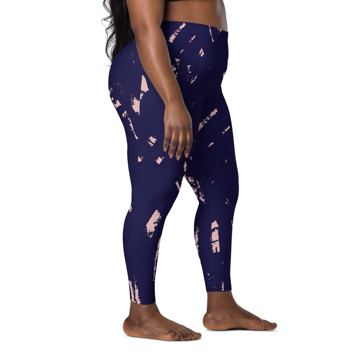 The Bristol Sculpt Leggings with high-waist, mild compression, and abstract brush stroke print in dark navy and pink