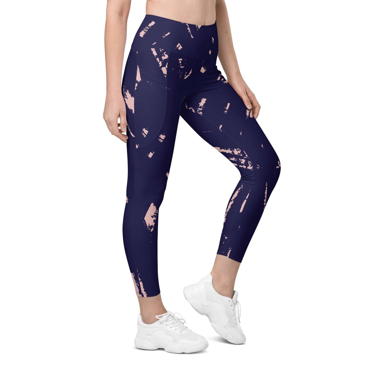 The Bristol Sculpt Leggings with high-waist, graffiti-style brush stroke print in electric pink on black, featuring mild compression and deep side pockets