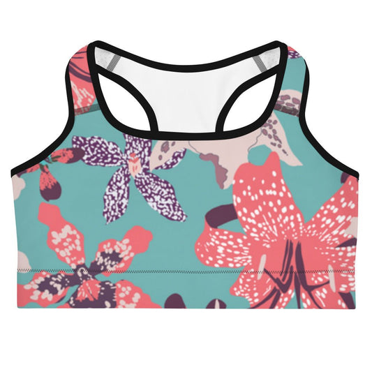 The Chelsea Performance Bra, high-compression performance sports bra featuring a vibrant tropical floral print in turquoise and pink.