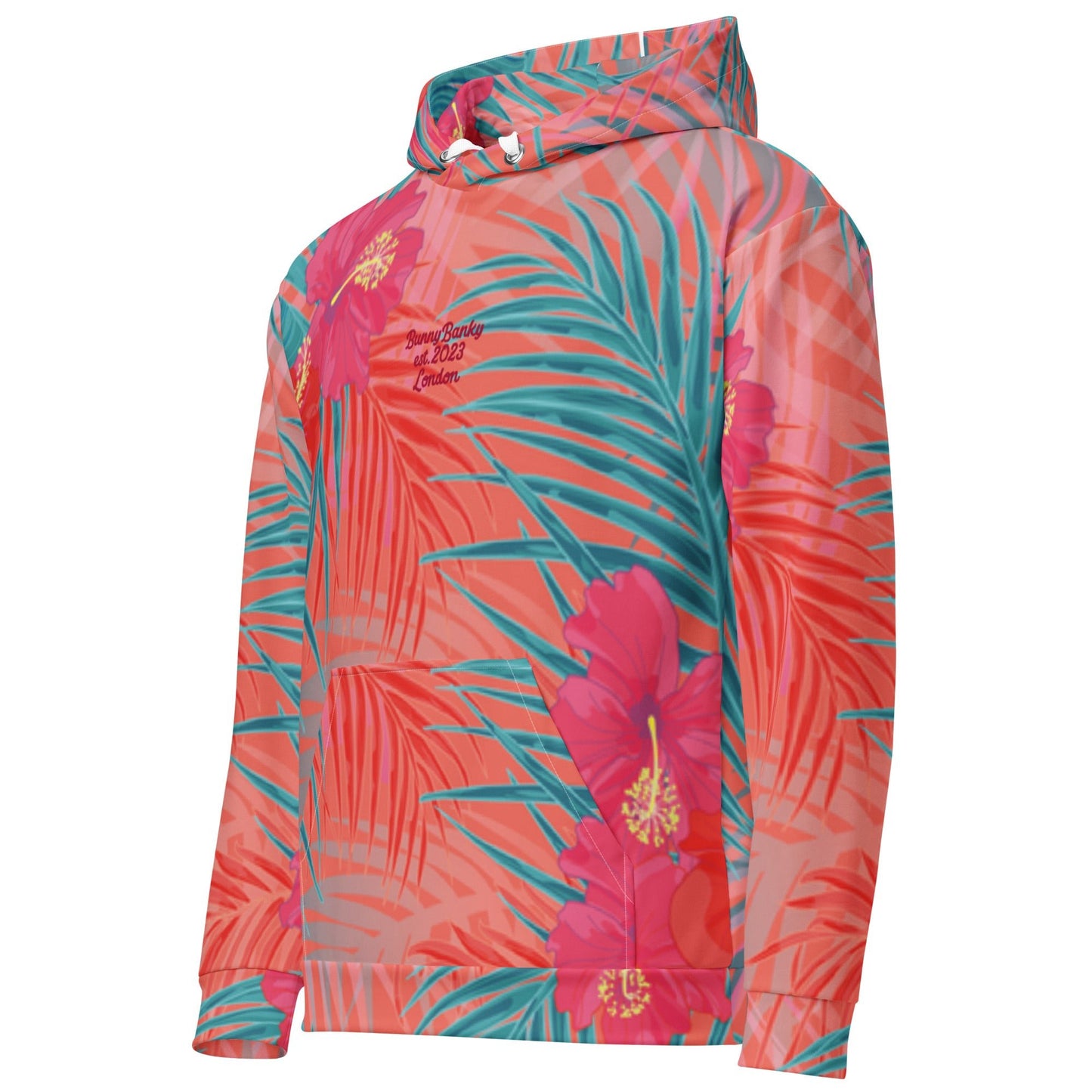 A close up of the BunnyBankY District hoodie highlighting the vibrant pink , orange, and blue colours in a tropical floral print