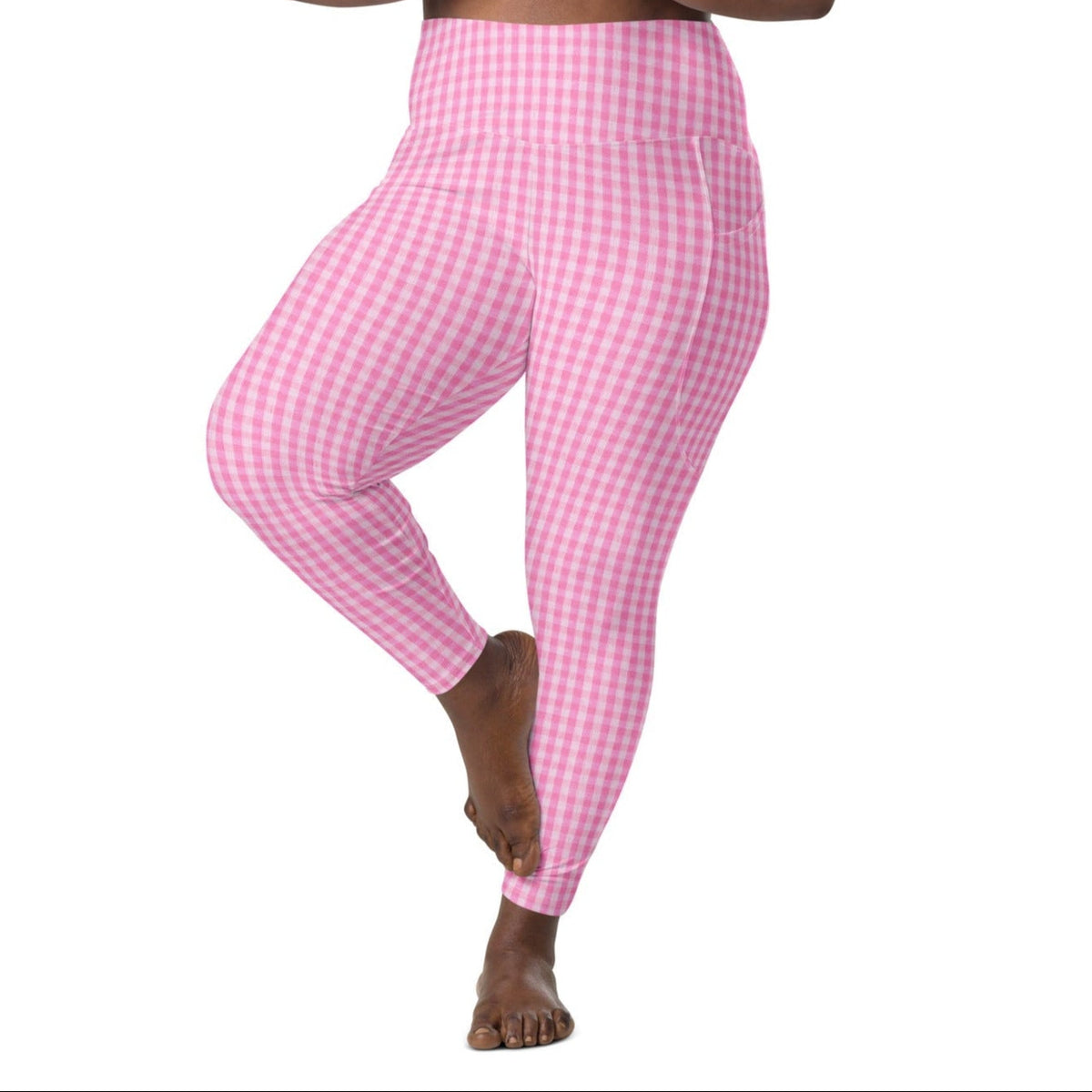 A model wearing the EcoFlex Sculpt Leggings in plaited pink pattern