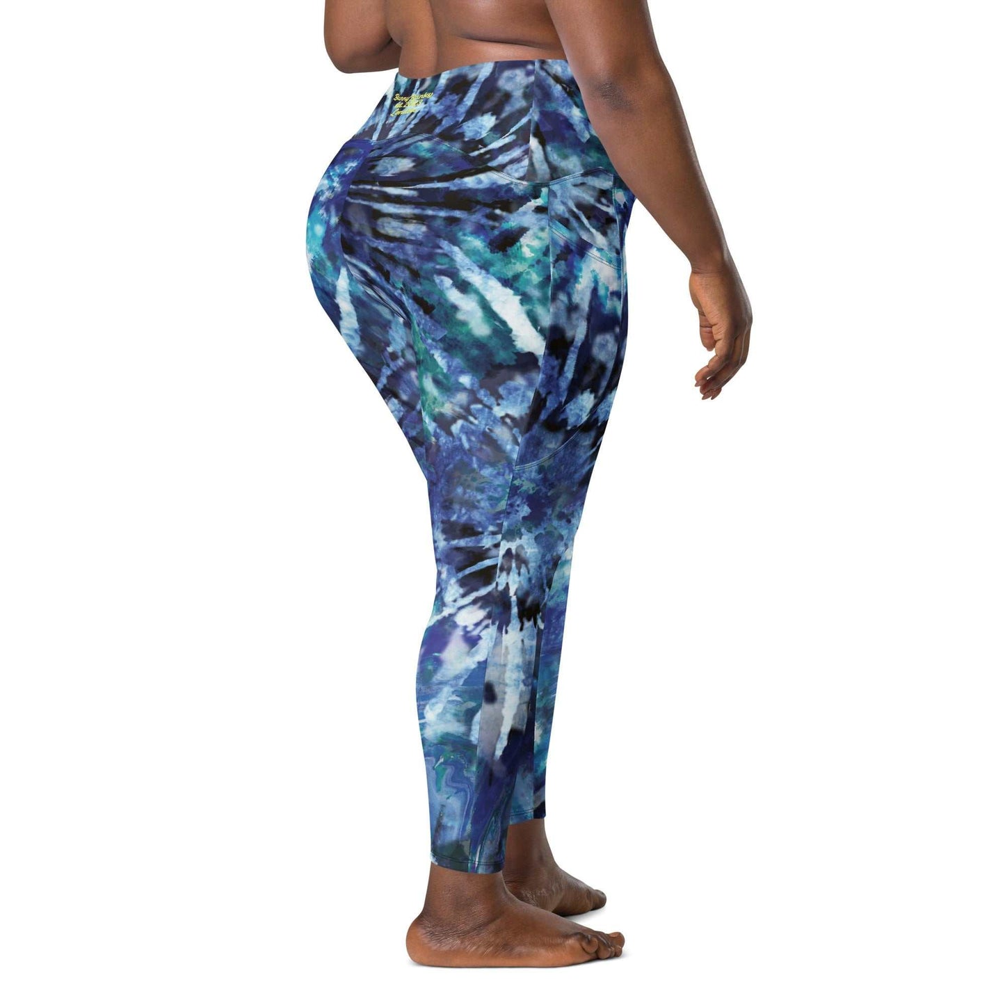 High-waisted blue tie-dye leggings with side pockets designed for comfort and support