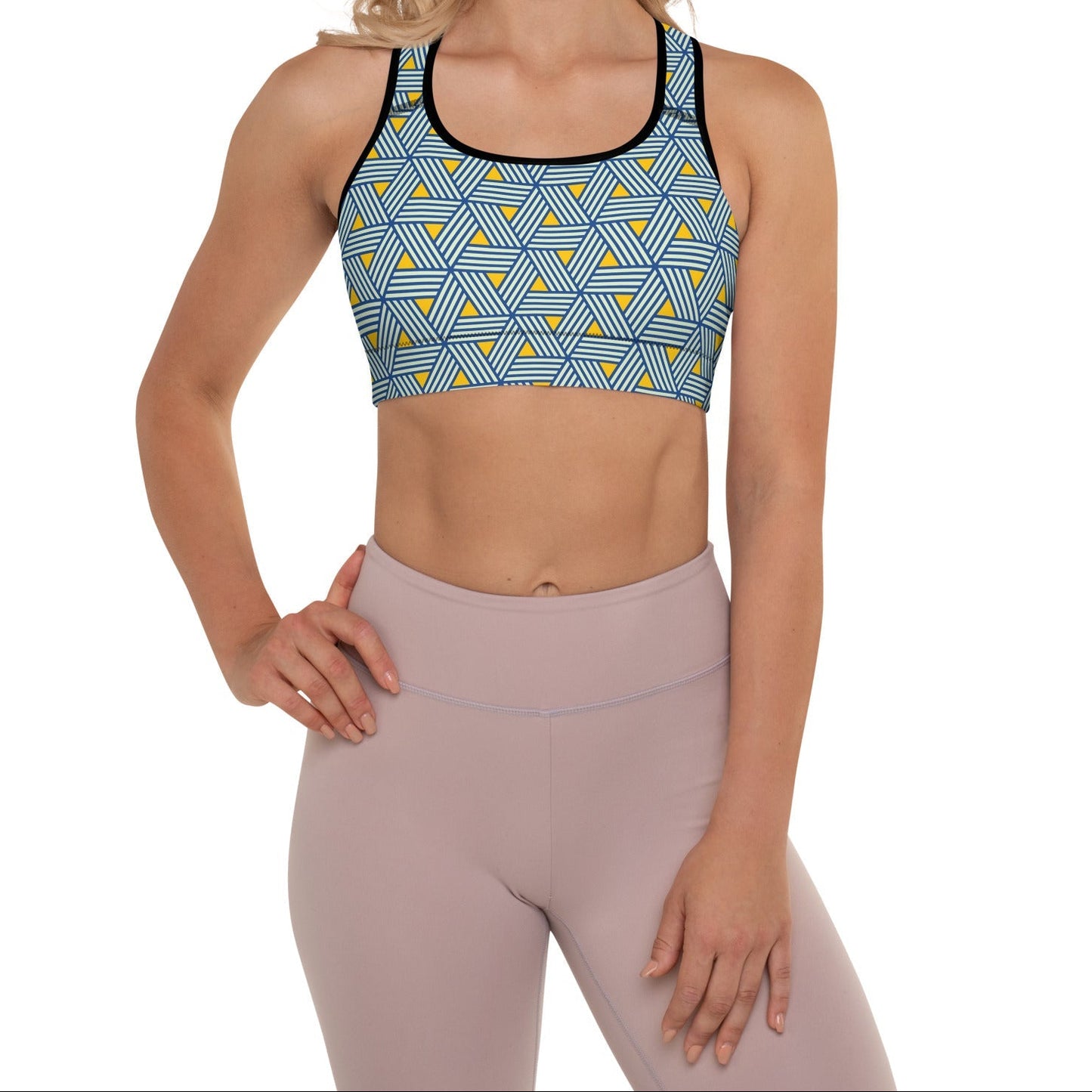 Model wearing the Geneva Performance Bra featuring a pattern of interweaved blue lines in yellow background.