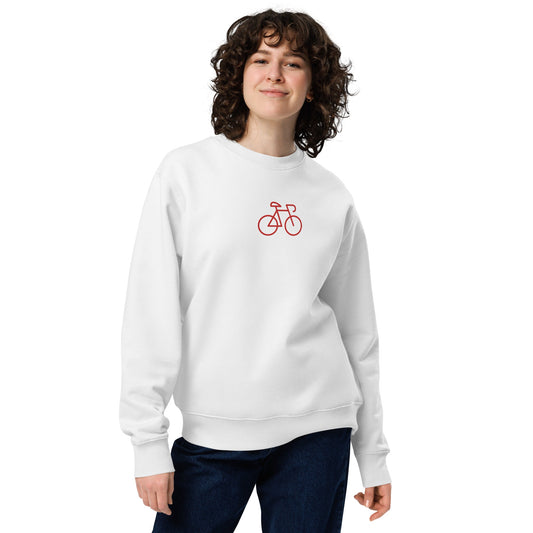 A model wearing The Holborn Organic Sweatshirt, showing the regular fit and the small, embroidered red bicycle detail on the chest.