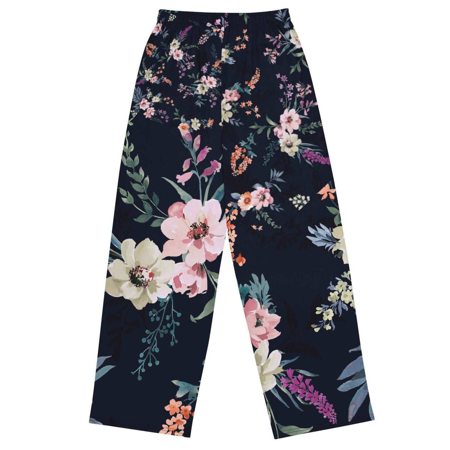 A close up of the Kew Botanical Wide Leg Joggers. The image highlights the cohesive floral print across joggers, emphasizing the premium drape of the wide-leg cut.