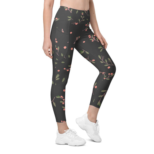 Manchester Sculpt Leggings with high-waist fit, pink floral print on khaki green, mild compression, and side pockets for activewear.
