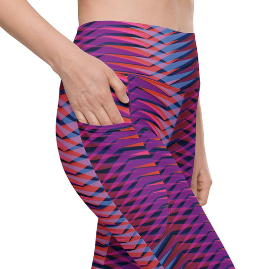 The Moorgate Sculpt Legging with dynamic pink, orange, and blue arrow print, high-waist fit, dual side pockets, and mild compression fabric