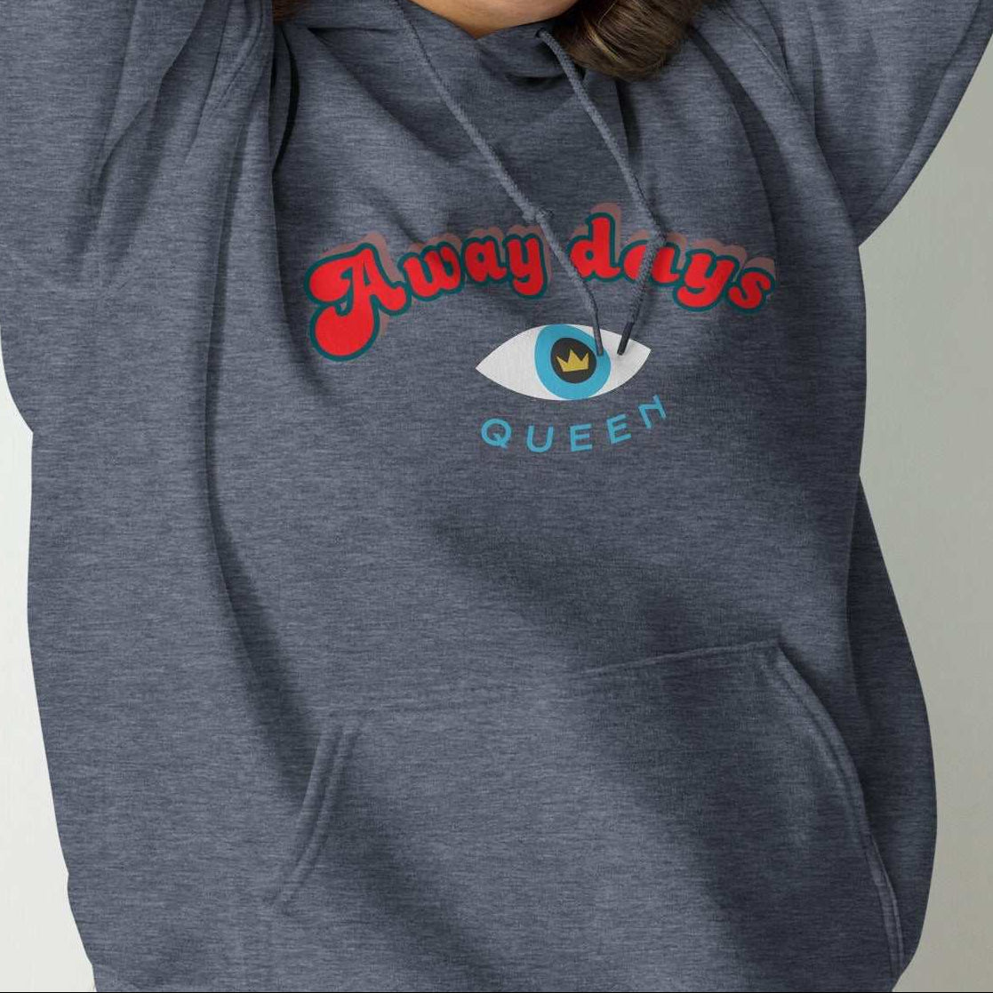 A model wearing The Mykonos Hoodie, showing the relaxed fit, drawstring hood, and the Crown and "Queen" print on the front center.