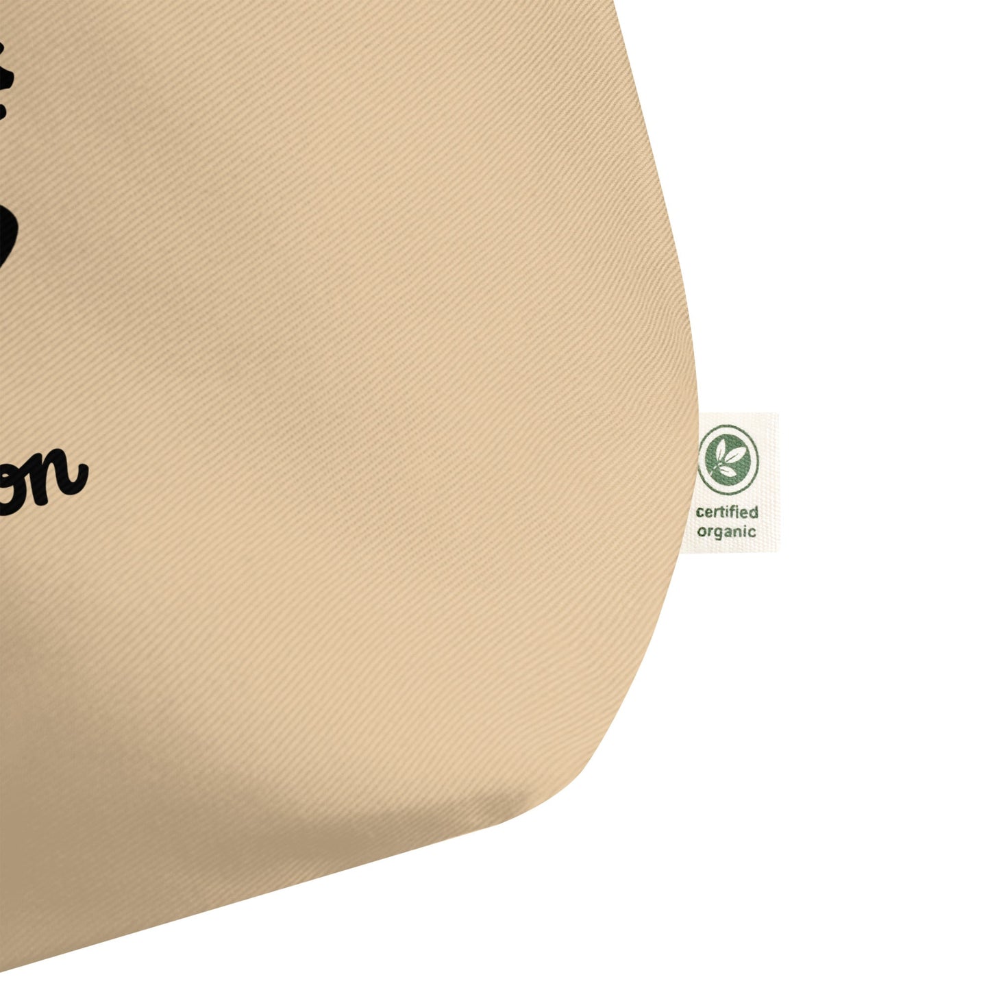 beige certified organic cotton The Never Full Atelier Tote corner with fabric texture and label tag