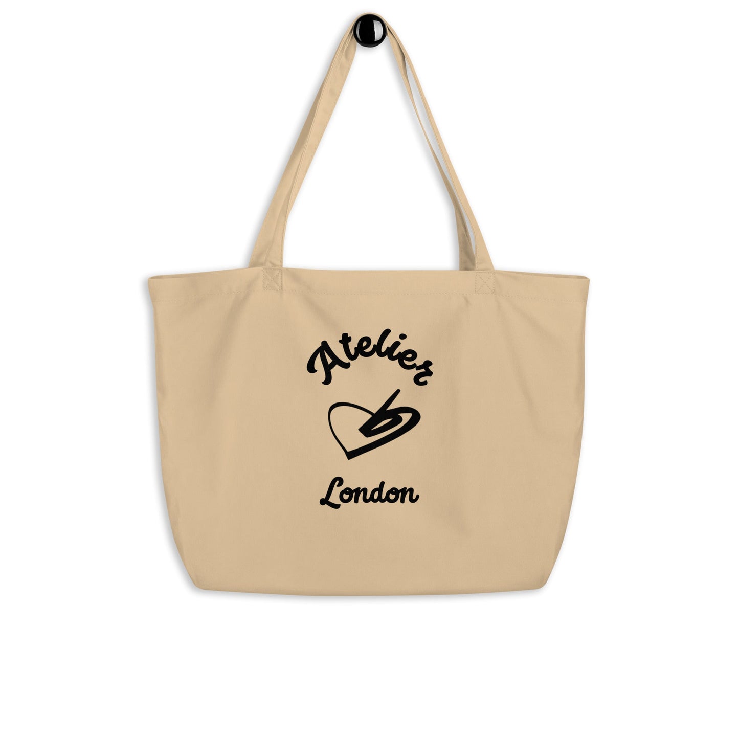 The Never Full Atelier Tote made of 100% organic cotton with spacious design and long dual straps in beige color with Atelier London print