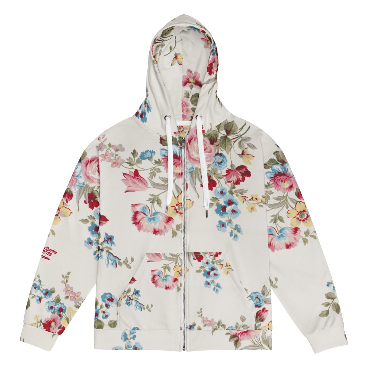 Close-up of The Pink Blush Zip Hoodie fabric, highlighting the textured, off-white base, the delicate floral print detail, and the soft texture of the 95% recycled polyester.