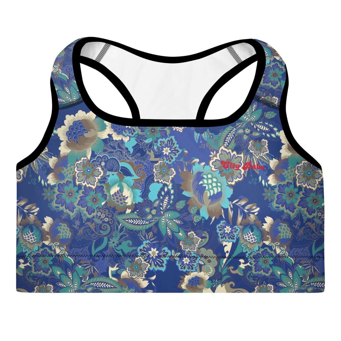 Close-up of the Rio Performance Bra, showing the supportive fit and the vibrant bright blue floral print with City Babe on the top left. Highlights the garment's construction from 74% recycled polyester.
