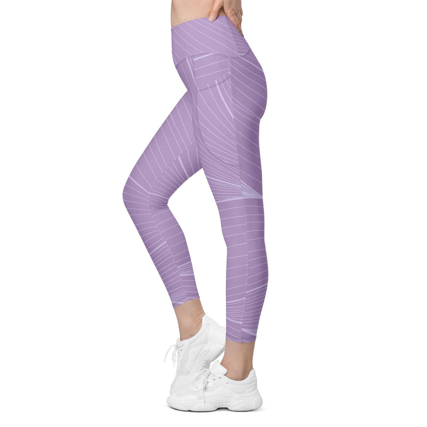The Roma Sculpt Leggings in light lilac with graphic spiral print, high-waisted, mild compression, and dual side pockets.