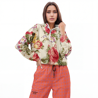 BunnyBankY AI Model wearing The By The River floral jacket and Southwark Flow Joggers in orange with lilac shapes on a white background