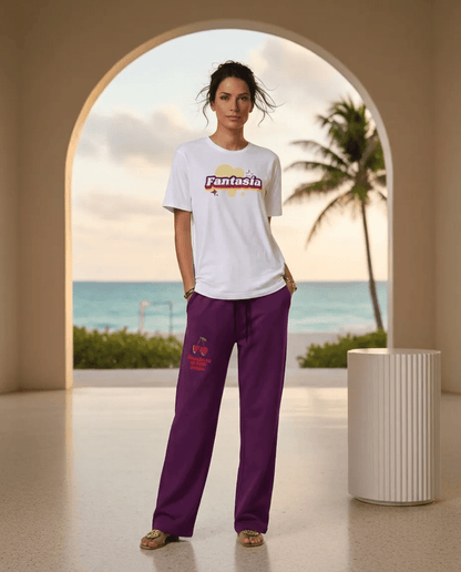A BunnyBanky AI proprietary model wearing The Tokyo Purple Flow Wide Joggers, showing the relaxed fit and the playful Pop Cherry print on the dark purple fabric.