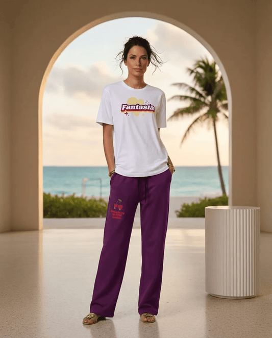 A BunnyBanky AI proprietary model wearing The Tokyo Purple Flow Wide Joggers, showing the relaxed fit and the playful Pop Cherry print on the dark purple fabric.