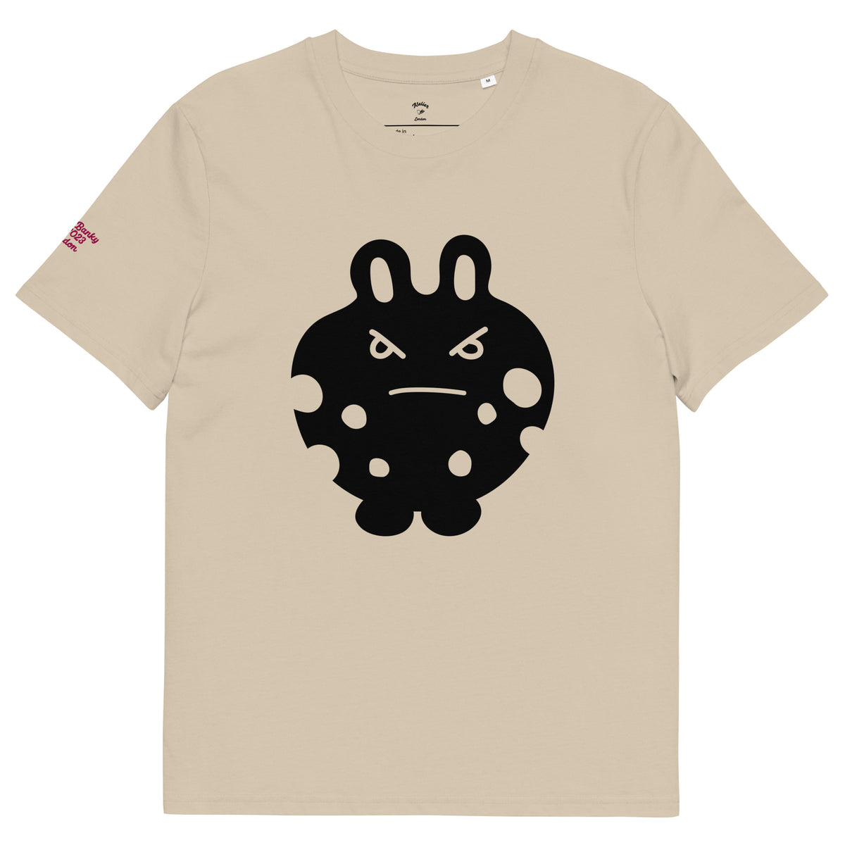 Front view of the BunnyBanky unisex organic cotton t-shirt in desert dust beige, featuring a bold black bunny monster character graphic printed on the center chest, and a smaller one at the back