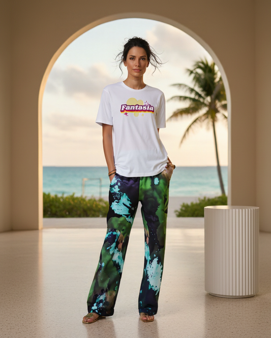 A BunnyBankY AI proprietary Model wearing the Fantasia t-shirt and The Abstract Flow Joggers, showing the wide-leg cut and the abstract expressionism-inspired print in green and blue hues.