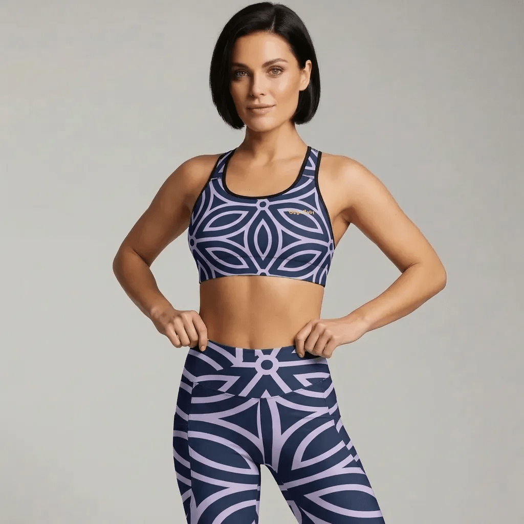 BunnyBankY AI proprietary model wearing the Canary Wharf Performance Bra and matching Canary Wharf Crossover  Leggings in blue and lilac geometric floral pattern