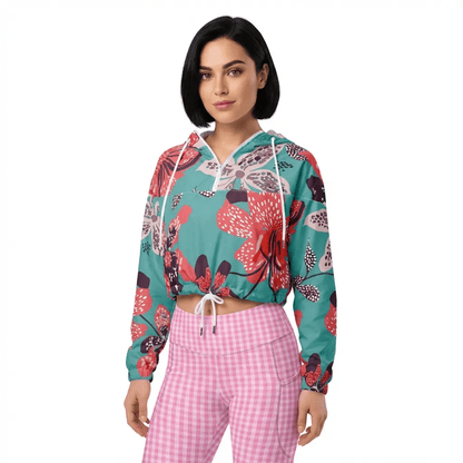 BunnyBankY AI proprietary model wearing the EcoFlex Sculpt Leggings  in plaited pink pattern, and the Chelsea Shell in tropical floral pattern on soft blue background.