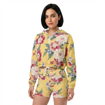 BunnyBanky AI model wearing The Toronto Windbreaker, showing the lightweight jacket's fit and the signature vintage floral print in yellow, and matching Toronto Biker Shorts