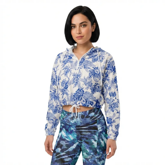 BunnyBankY AI Model wearing The Saint Germain Windbreaker in blue vintage floral print on cream fabric, and The Athens Sculpt Leggings.