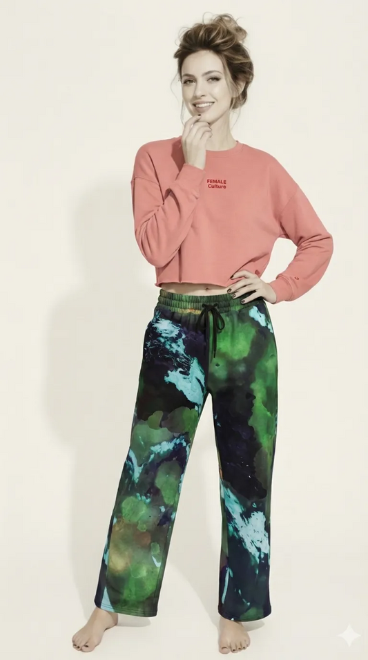 AI proprietary model wearing The Sisterhood Crop Sweatshirt, showing the raw hem, dropped shoulder cut, and the embroidered "Female Culture" motto on the chest.