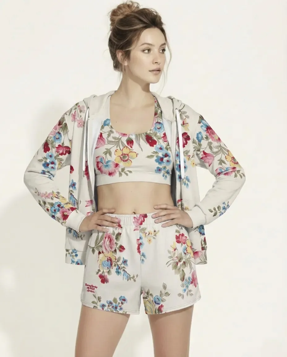 BunnyBankY AI proprietary model wearing the complete Pink Blush Set (Zip Hoodie and Athletic Shorts), showcasing the cohesive serene floral pattern and premium sustainable fit.