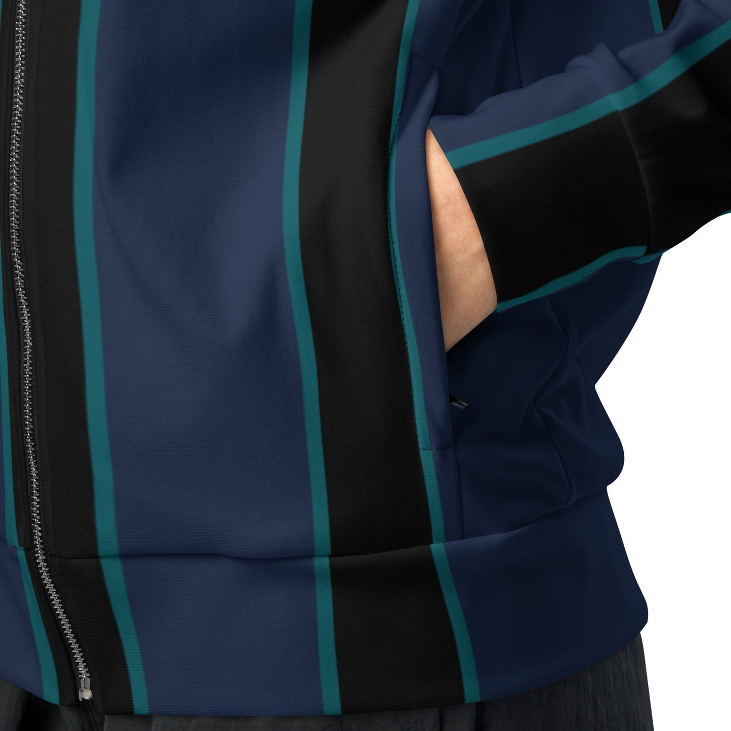 A close-up of the recycled polyester fabric of The Regent Track Jacket, showing the soft, smooth exterior and the striking vertical stripe pattern.