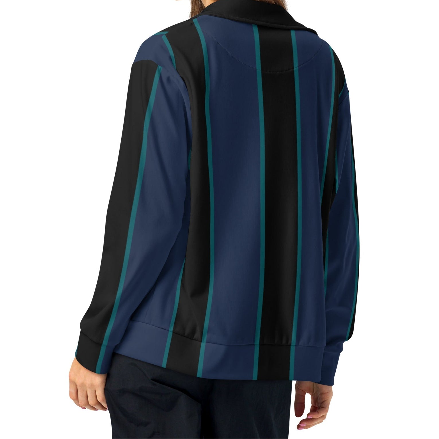 A model wearing The Regent Track Jacket, showing the premium slim fit, full-zip closure, and the vertical green and blue stripe print on the navy background.
