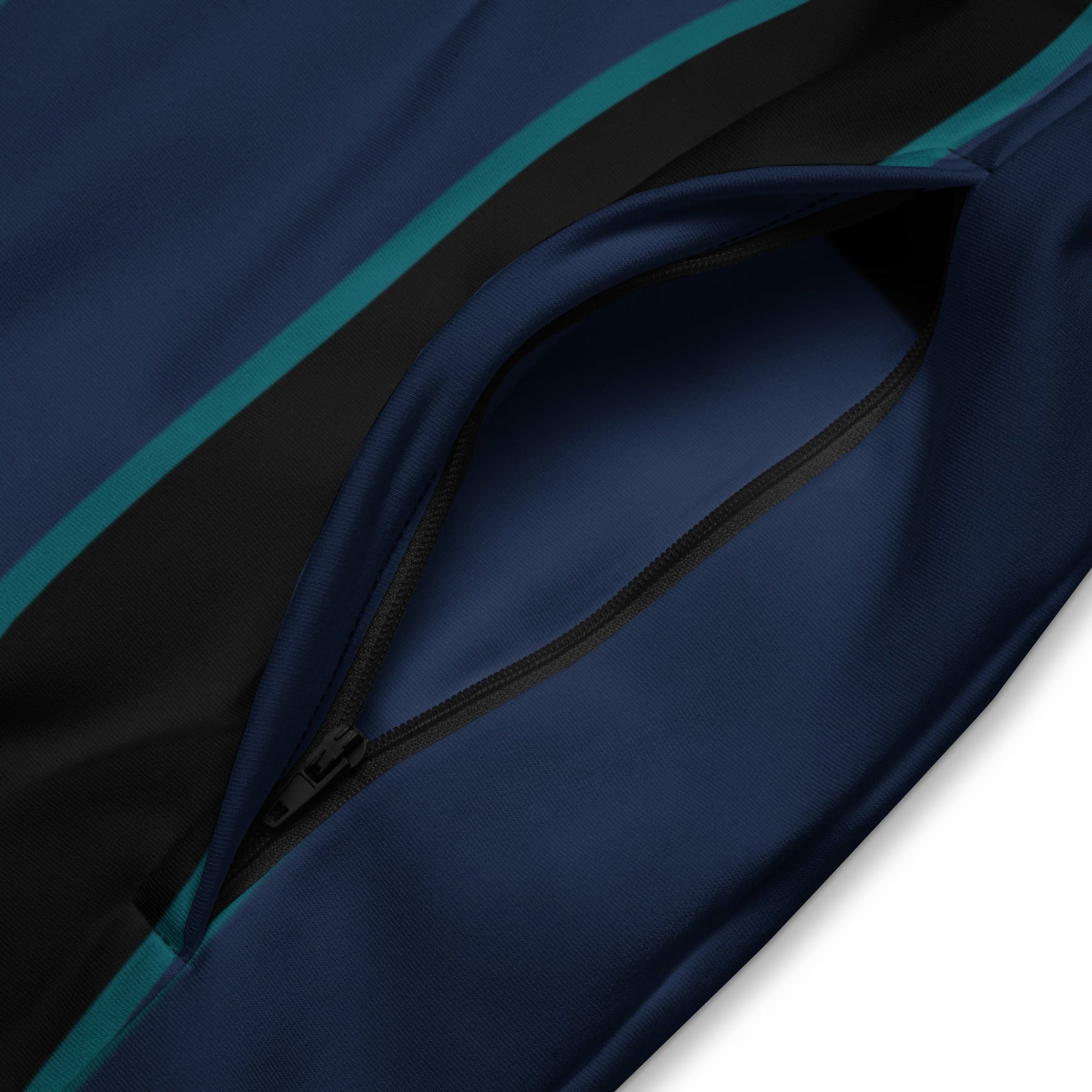 A close-up of the recycled polyester fabric of The Regent Track Jacket, showing the soft, smooth exterior and the striking vertical stripe pattern.