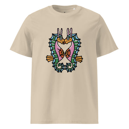 A dusty beige organic t-shirt featuring a symmetrical graphic of two colorful seahorses with bunny ears and floral details.
