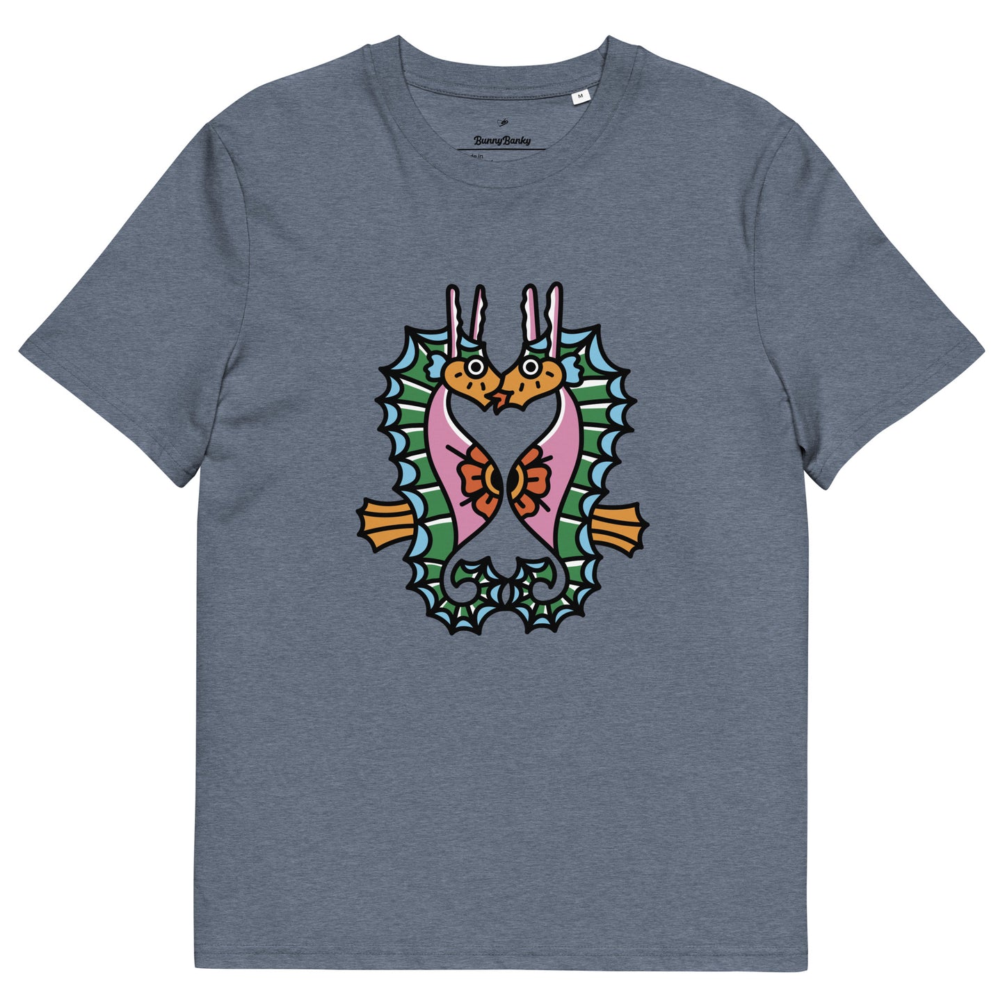 A_denim_blue_organic_t-shirt_featuring_a_symmetrical_graphic_of_two_colorful_seahorses_with_bunny_ears_and_floral_details.