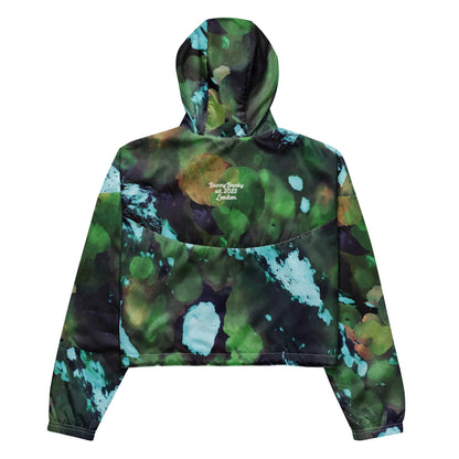 A close-up of The Abstract Crop Shell's fabric, highlighting the texture and the fluid, painterly abstract expressionism print.