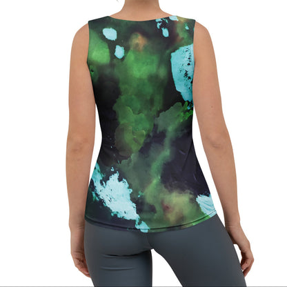 A woman modeling  the abstract flow performance tank, a a sleeveless athletic tank top with a green, teal, and black abstract watercolor pattern, paired with gray leggings, against a plain white background.