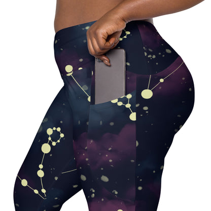 A BunnyBankY AI proprietary model wearing The Andromeda Sculpt Leggings, showcasing the sculpting fit and the distinctive yellow star constellation print on the dark purple-to-black gradient fabric. The background features a subtle cosmic nebula.