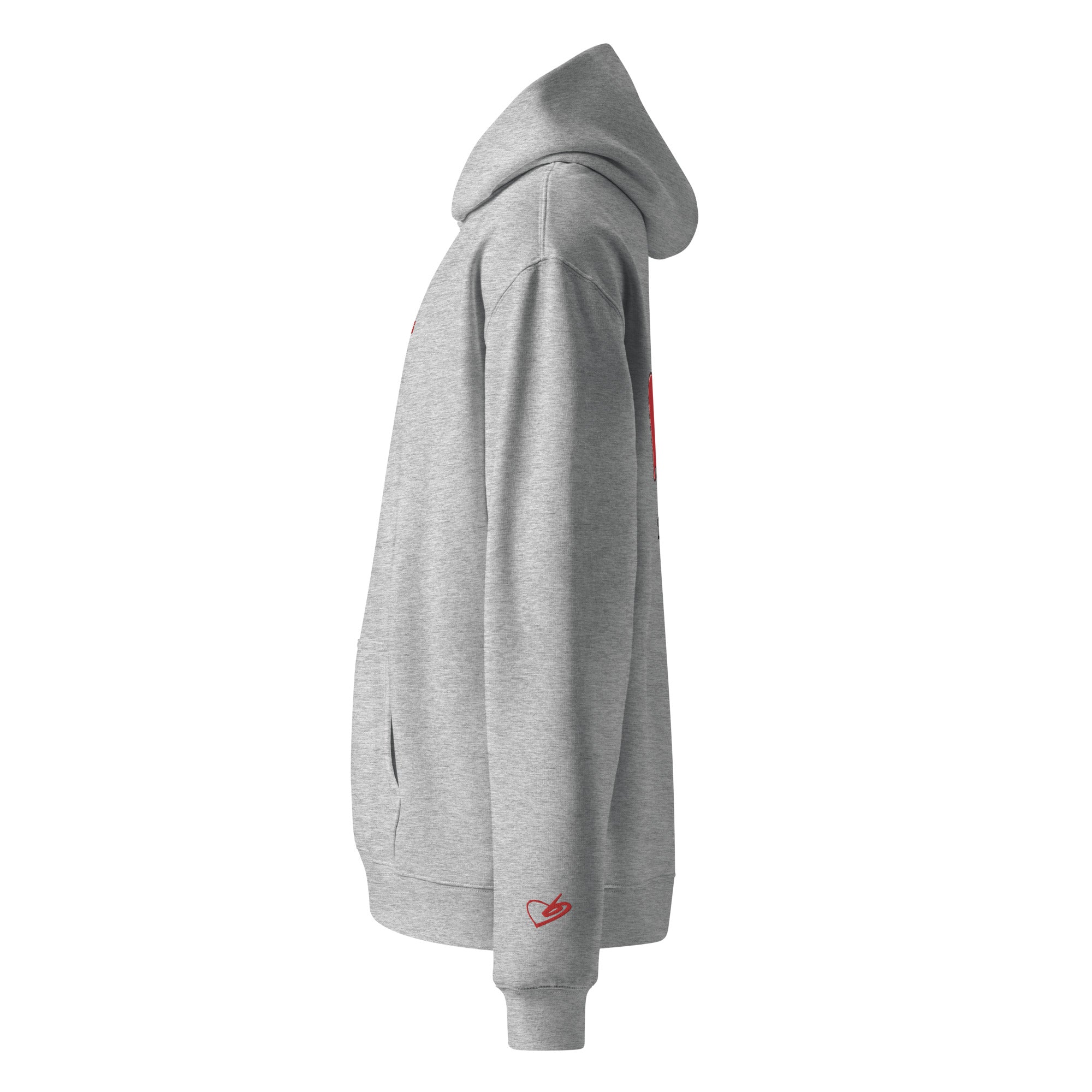 A close up of The Angel Wellness Hoodie, showing the oversized fit and the embroidered BunnyBanky iconic heart logo on the sleeve