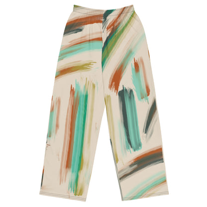 the artful aura flow joggers. high-waisted, wide-leg pants featuring an abstract brushstroke pattern in beige, brown, teal, and green, set against a plain white background.