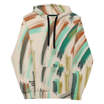 A close-up of The Artful Aura Hoodie's print, highlighting the gentle, painterly brushstrokes and the serene pastel green and beige colors.