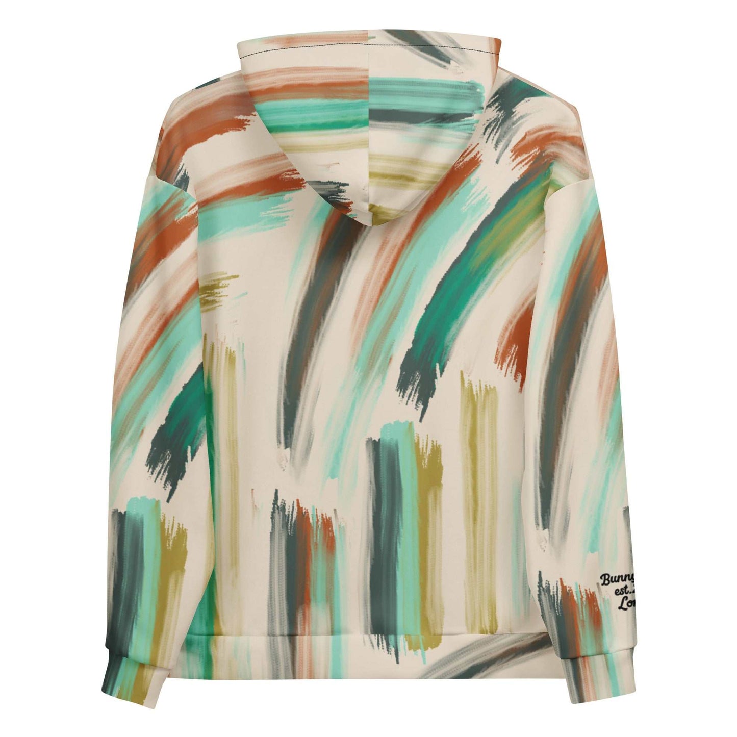 A close-up of The Artful Aura Hoodie's print, highlighting the gentle, painterly brushstrokes and the serene pastel green and beige colors.