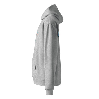 A close up of The Azimuth Oversized Hoodie, showing the relaxed fit, drawstring hood.