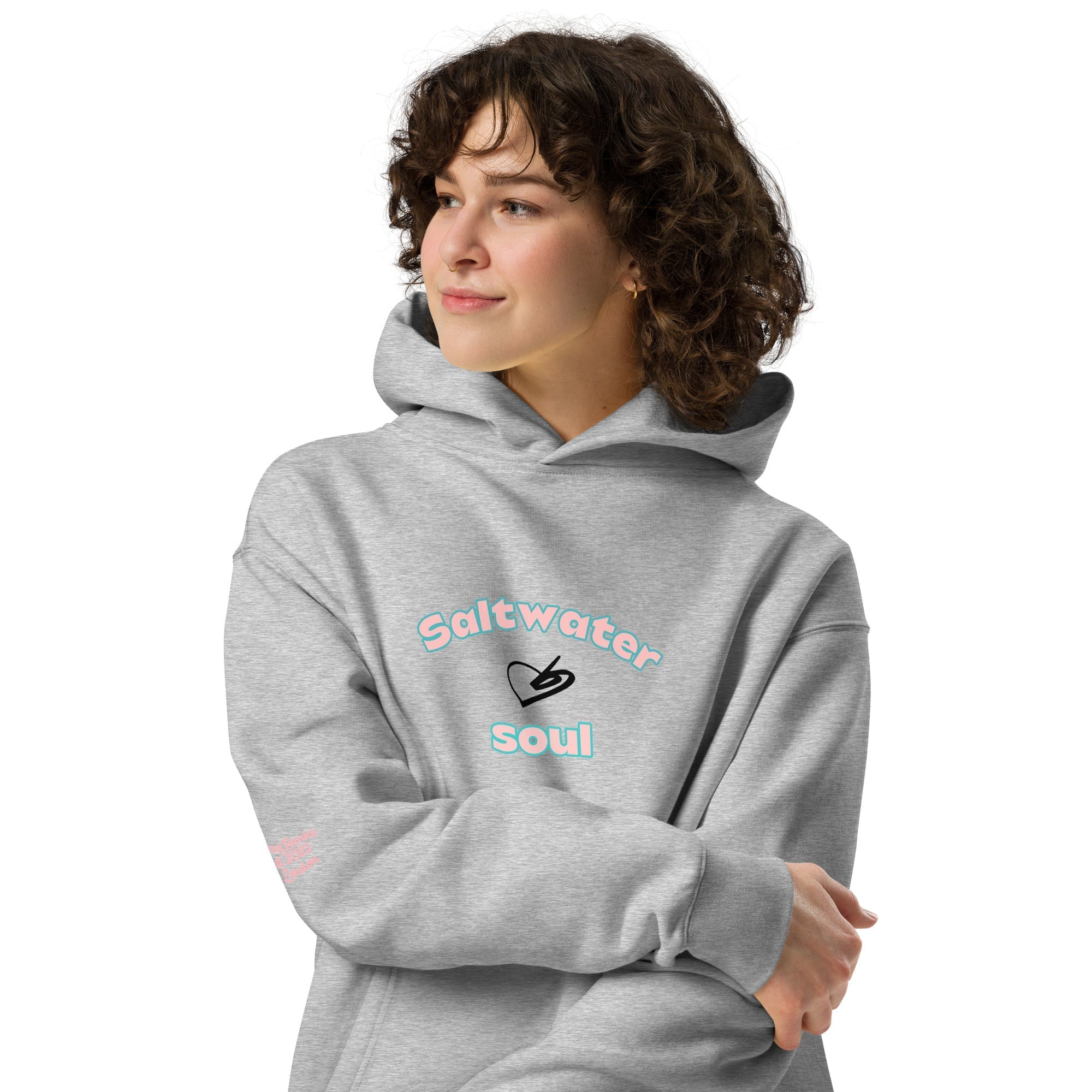 A model wearing The Azimuth Oversized Hoodie, showing the relaxed fit, drawstring hood, and 