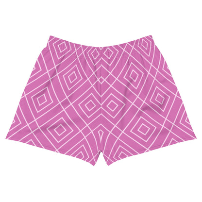 A model wearing the Bahamas Athletic Shorts, featuring an elaborate pink and white geometric lattice print.