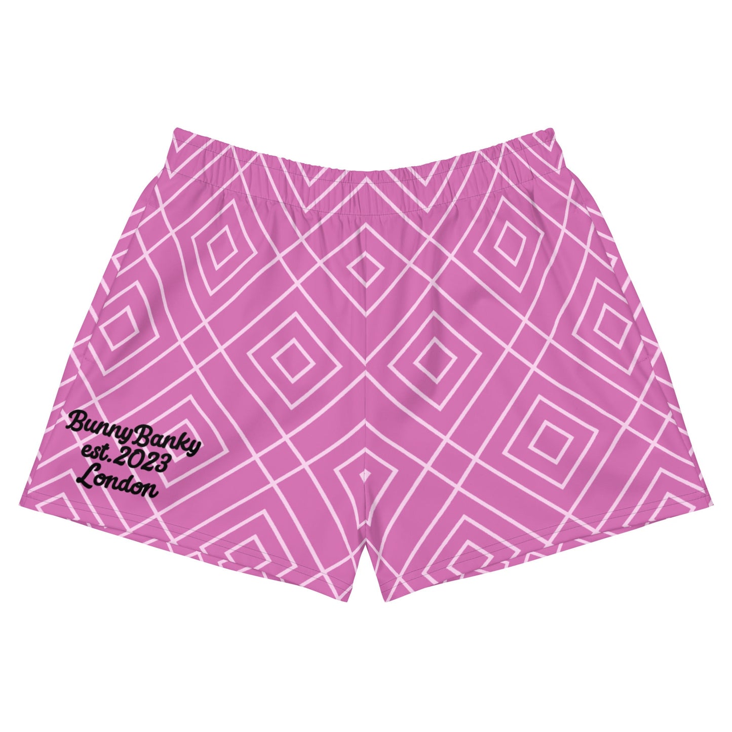 A close up of the Bahamas Athletic Shorts, featuring an elaborate pink and white geometric lattice print.
