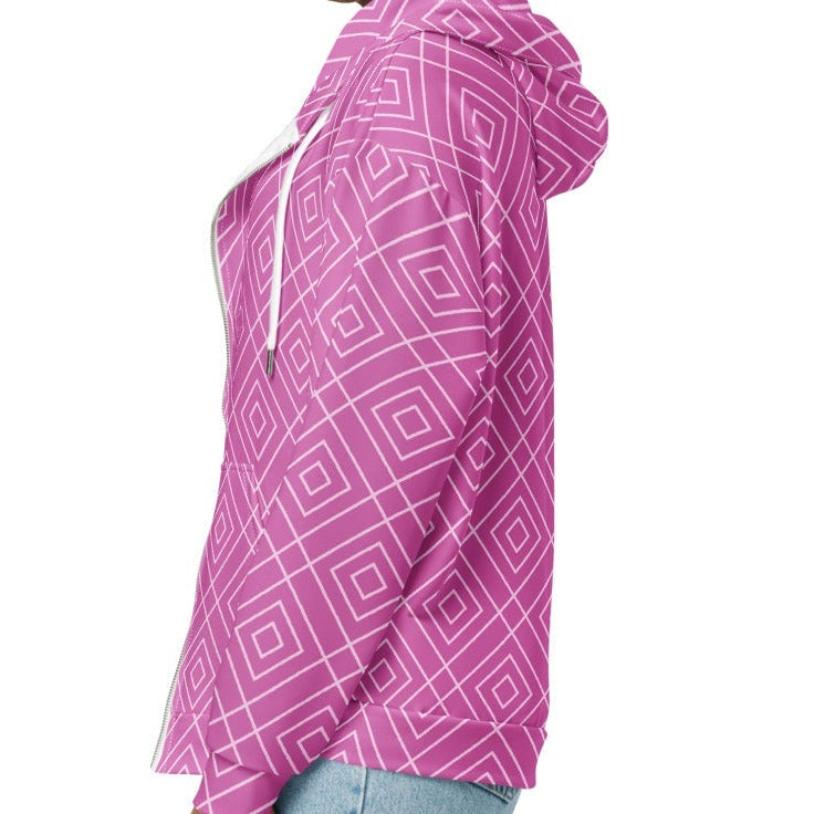 model wearing the Bahamas Zip Hoodie, showcasing the elaborate white diamond lattice print on a vibrant pink background.